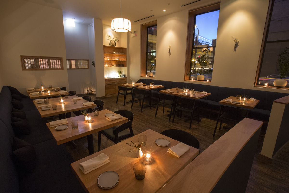 A candle-lit bar with modern Japanese design.
