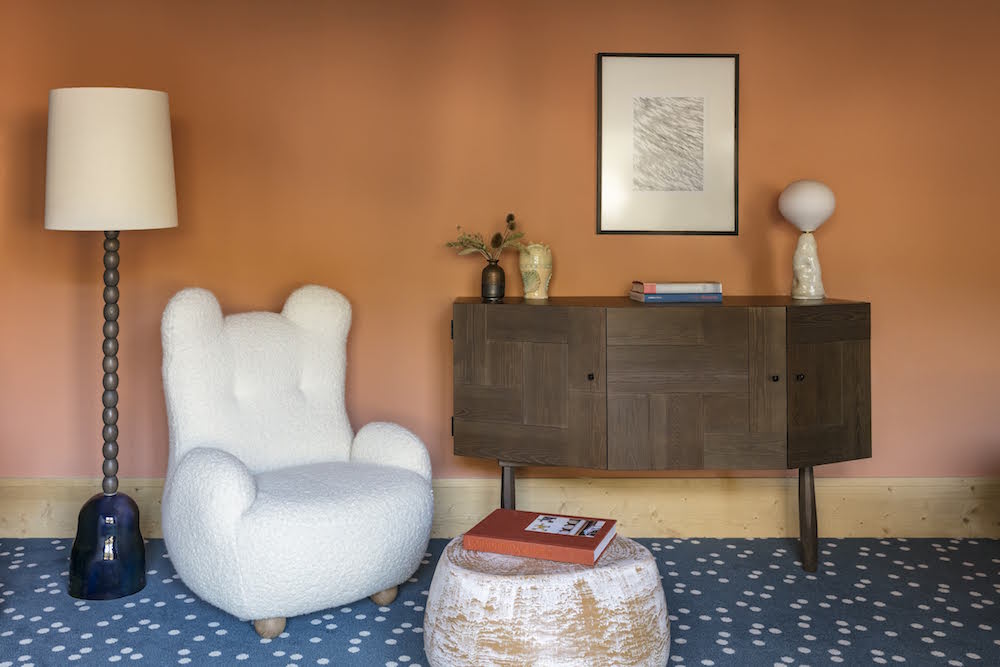 Bear chair next to lamp and on snow-inspired carpet