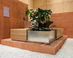vestre displays urban furniture on stand of low waste + reusable components in stockholm