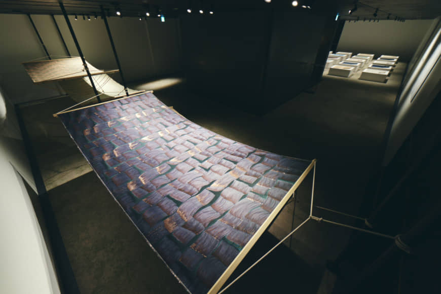 Seeing both sides: Mae Engelgeer's 'Sinuous' installation at the Hosoo Gallery's 'Colortage' exhibition is hung to allow visitors to view the top and reverse side of the fabrics. | COURTESY OF HOSOO