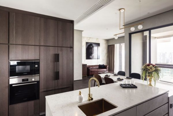 The open-plan layout segues from the kitchen to the living area seamlessly
