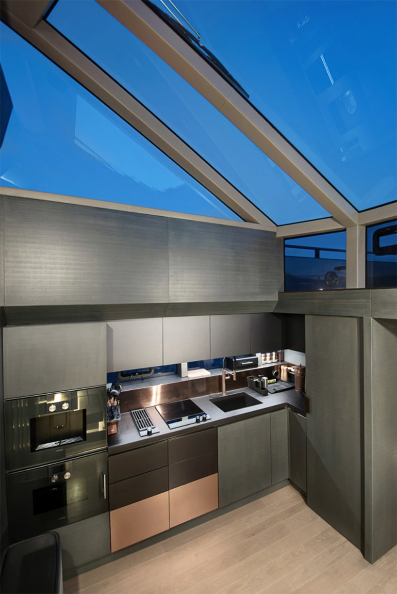 mazu's 82ft yacht combines an angular profile with cozy, home-like interiors designboom