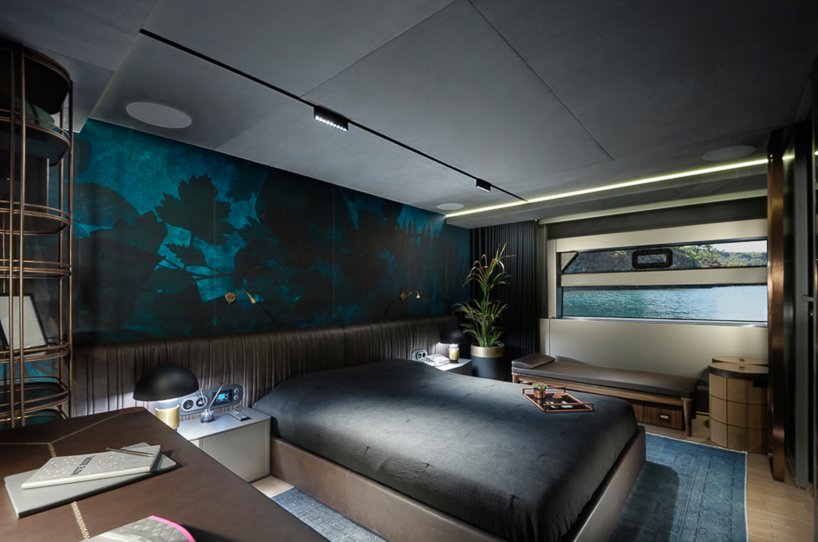 mazu's 82ft yacht combines an angular profile with cozy, home-like interiors designboom
