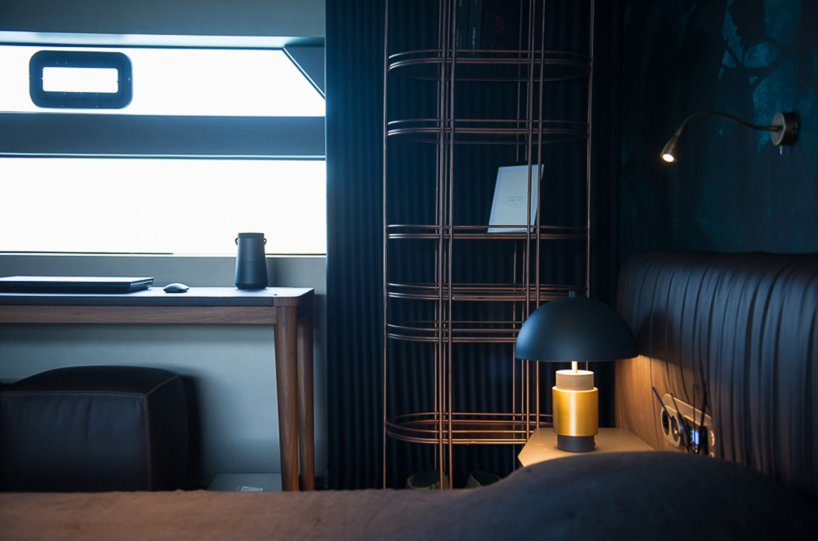 mazu's 82ft yacht combines an angular profile with cozy, home-like interiors designboom
