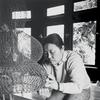 Ruth Asawa works on a crocheted-wire sculpture in her living room, ca. 1976. Photo by Allen Nomura.
