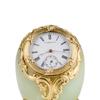 Egg-shaped desk clock Firm of Fabergé, workmaster Mikhail Perkhin St. Petersburg, Russia, before 1903. Bowenite, gilded silver, enamel. Private collection, New York, NY
